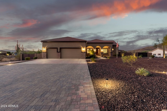 view of front of property featuring a garage