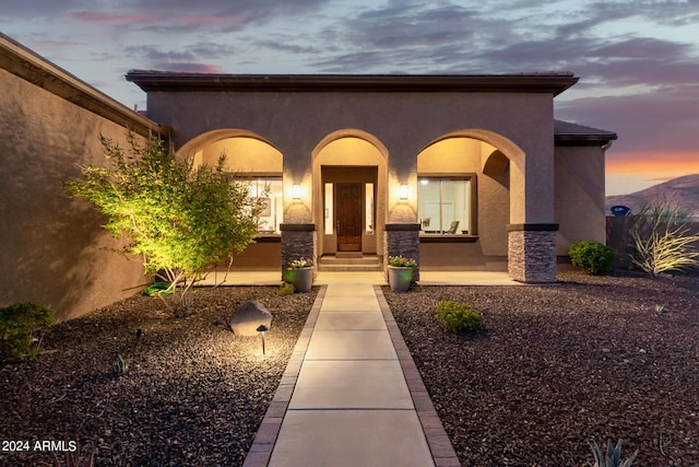 mediterranean / spanish-style house featuring covered porch