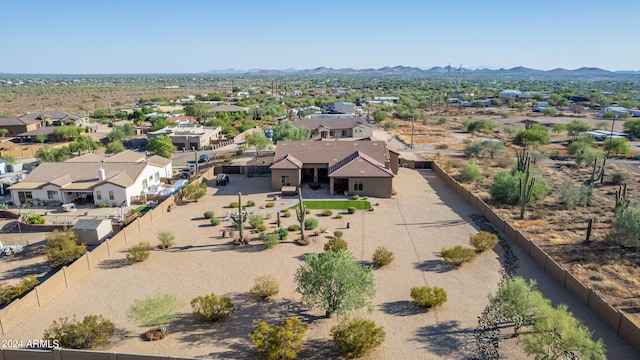 drone / aerial view featuring a mountain view