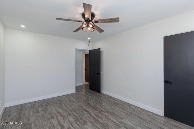 2501 E Campbell Ave, Phoenix, AZ 85016 - spare room featuring wood finished floors, ceiling fan, baseboards, and recessed lighting