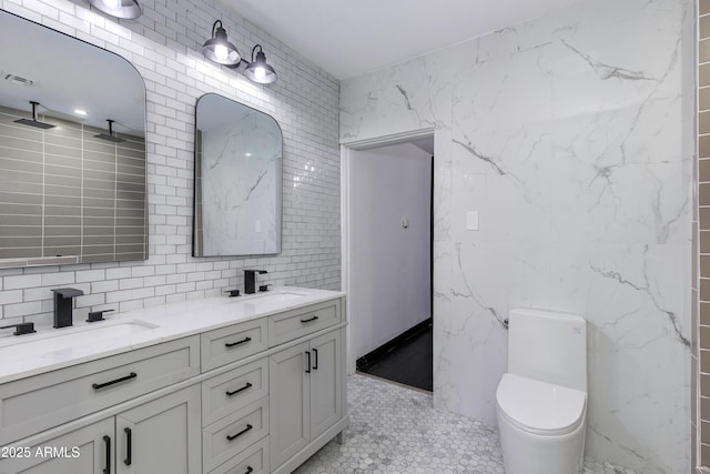 2501 E Campbell Ave, Phoenix, AZ 85016 - bathroom with tile walls, double vanity, backsplash, toilet, and tile patterned floors