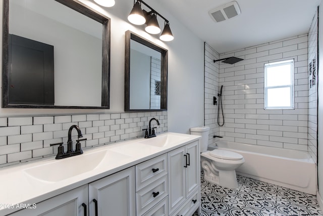 2501 E Campbell Ave, Phoenix, AZ 85016 - full bath with toilet, double vanity, backsplash, shower / bath combination, and tile patterned flooring