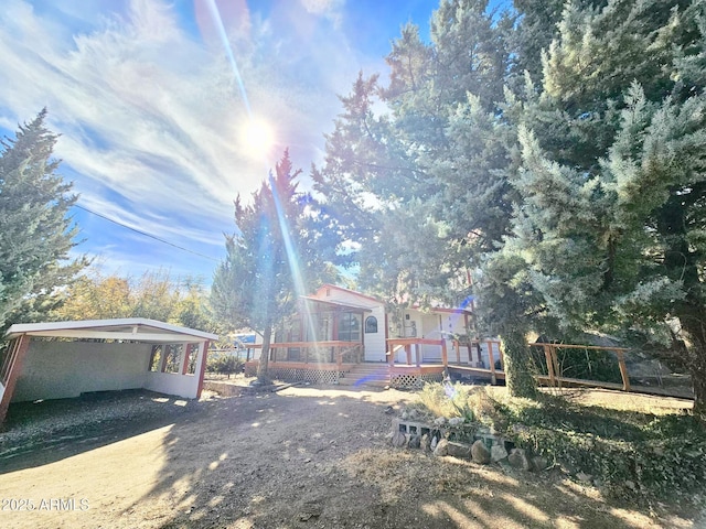 exterior space featuring a wooden deck