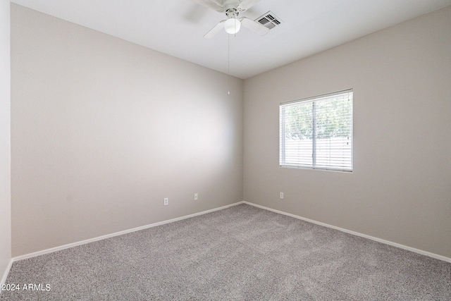 carpeted empty room with ceiling fan