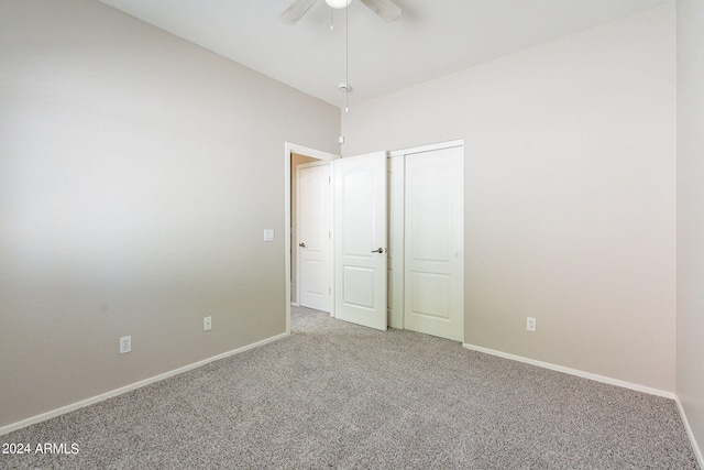 unfurnished bedroom with carpet and ceiling fan