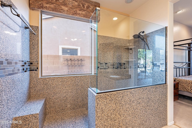 bathroom featuring tiled shower