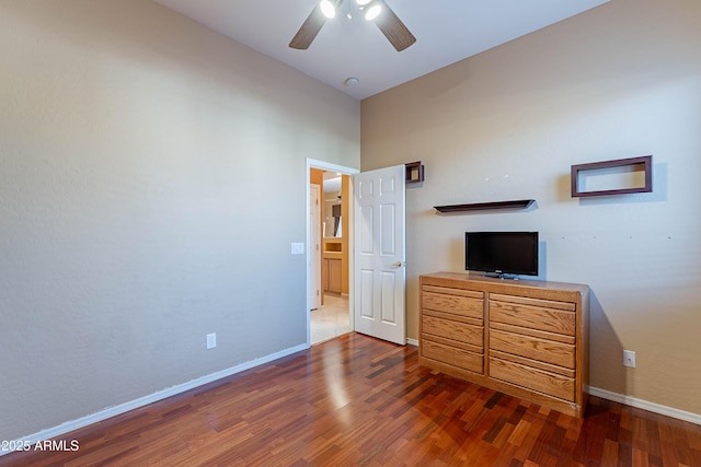 bedroom with dark wood-type flooring and ceiling fan