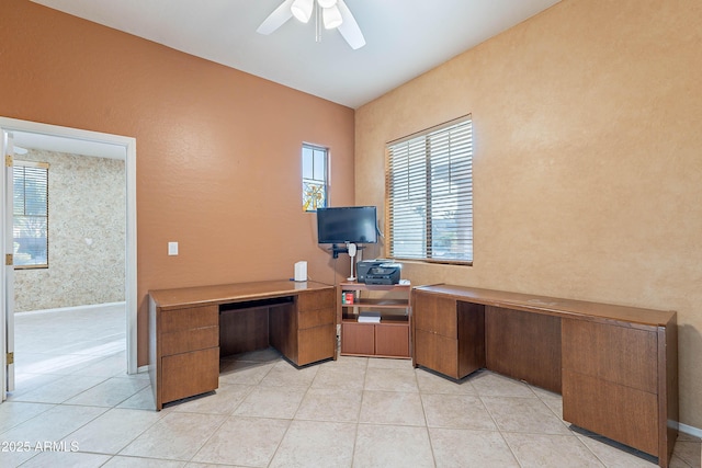 tiled office space with ceiling fan