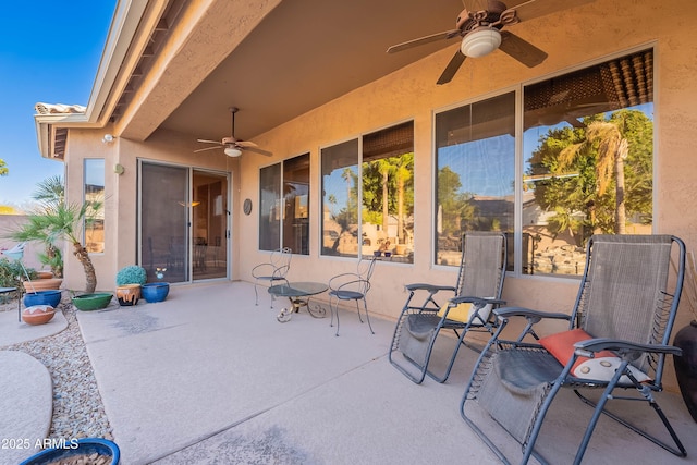 view of patio with ceiling fan