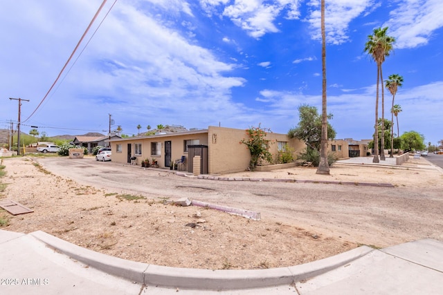 9847 N 11th Ave Unit 2, Phoenix, AZ 85021 - view of front of property featuring stucco siding and a residential view