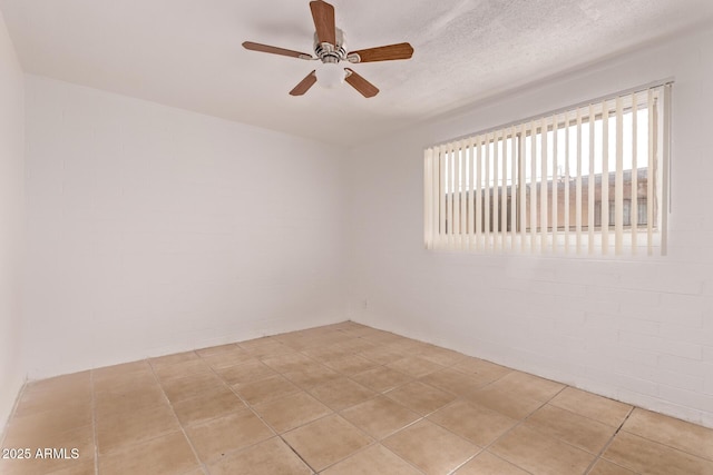 9847 N 11th Ave Unit 2, Phoenix, AZ 85021 - empty room featuring a ceiling fan and light tile patterned flooring
