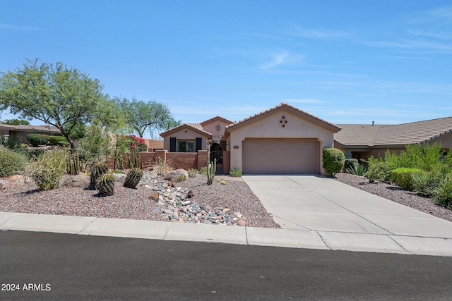 ranch-style house featuring a garage