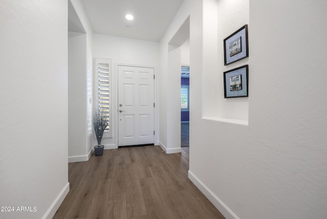 hallway featuring hardwood / wood-style floors