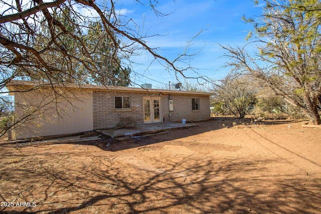 rear view of house featuring a patio area