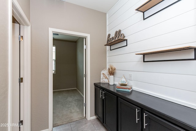 interior space featuring light tile patterned floors