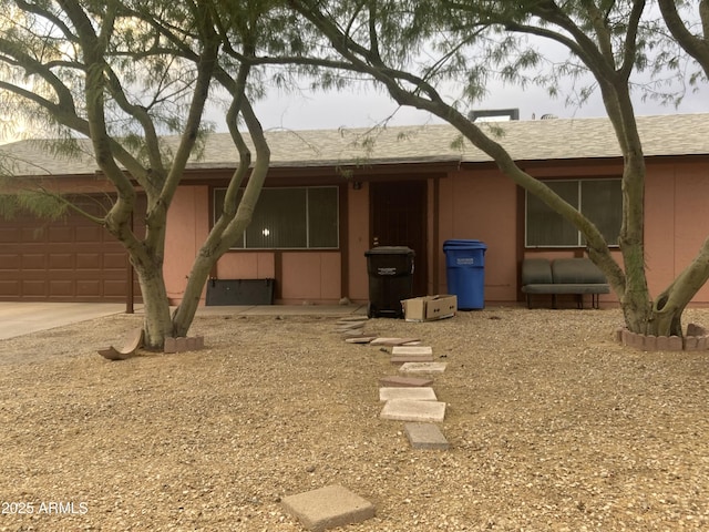 view of front of home featuring driveway and an attached garage