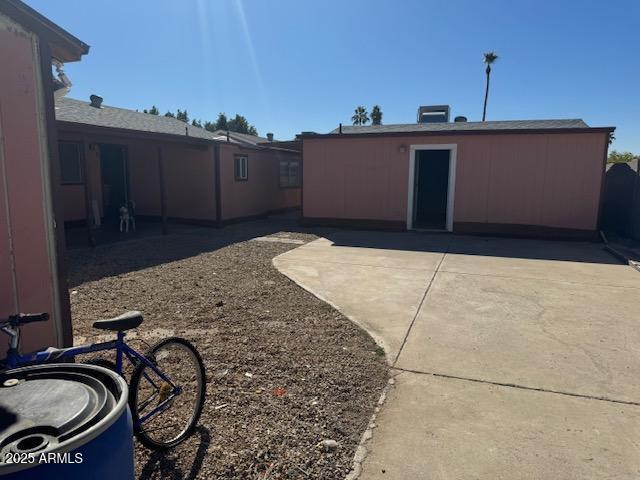 view of yard with a patio and fence