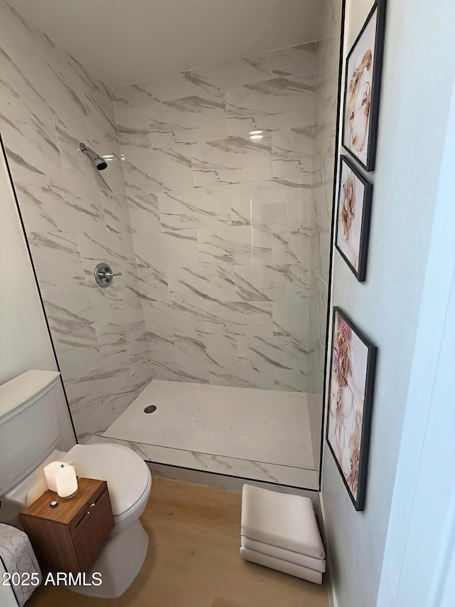 720 S Dobson Rd Unit 95, Mesa, AZ 85202 - full bathroom with toilet, a tile shower, and wood finished floors