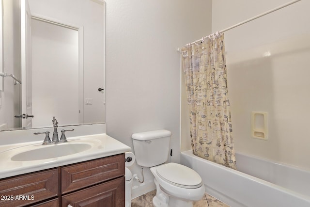 bathroom with vanity, tile patterned floors, toilet, and shower / bath combo