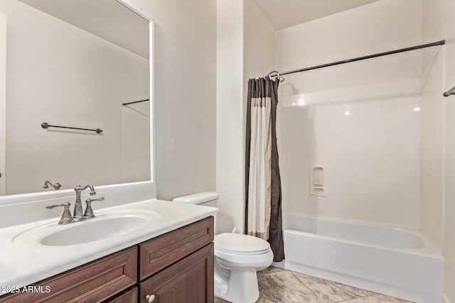 full bath featuring shower / bath combo with shower curtain, toilet, and vanity