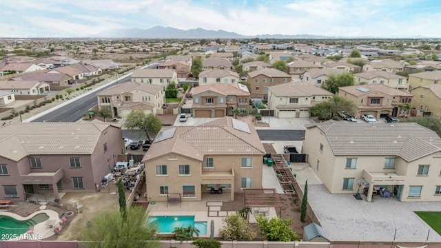 aerial view with a mountain view and a residential view