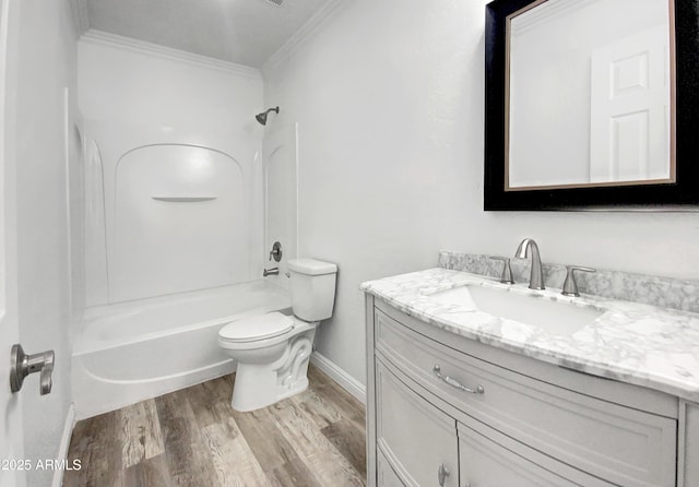 full bathroom featuring toilet, wood-type flooring, shower / bathtub combination, ornamental molding, and vanity