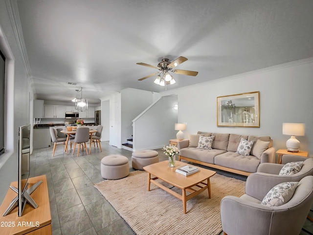 living room featuring crown molding and ceiling fan