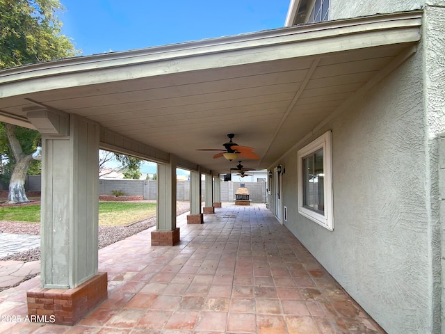 view of patio / terrace featuring ceiling fan