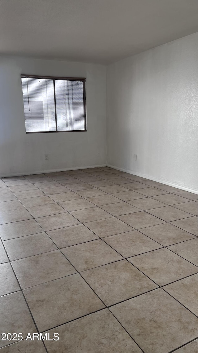 view of tiled empty room