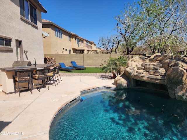 view of pool featuring outdoor dining space, a patio, and fence