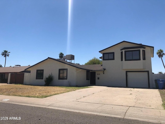 view of front of property featuring a garage