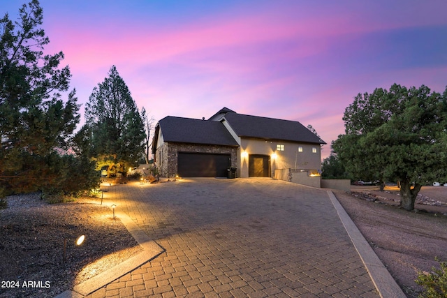 view of front of property with a garage