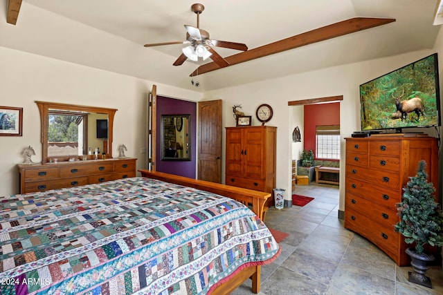 bedroom featuring lofted ceiling and ceiling fan