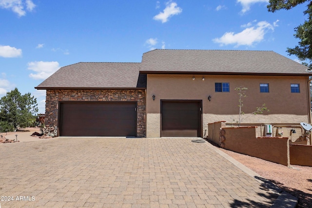 view of front of home featuring a garage