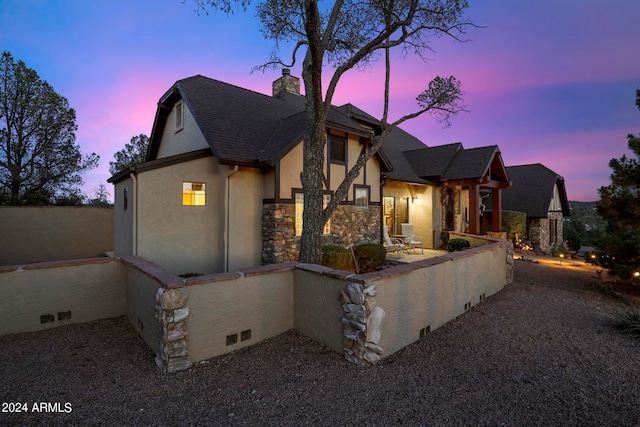 view of front of house with a patio