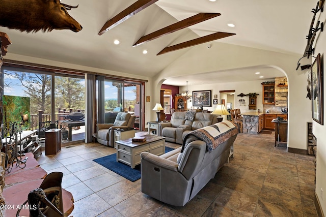 living room featuring an inviting chandelier and vaulted ceiling with beams