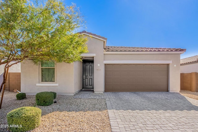 view of front of home with a garage