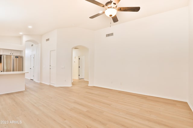 unfurnished room featuring light wood-type flooring and ceiling fan