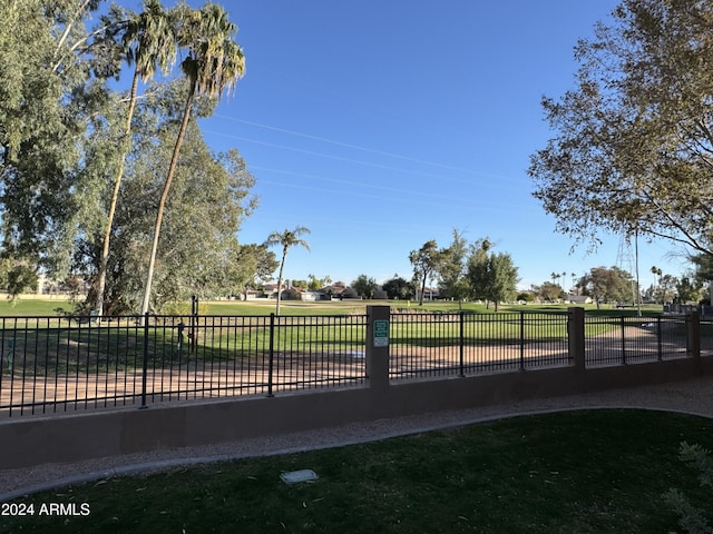 1335 E June St Unit 239, Mesa, AZ 85203 - view of gate with fence and a lawn