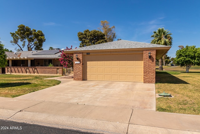 single story home with a front yard