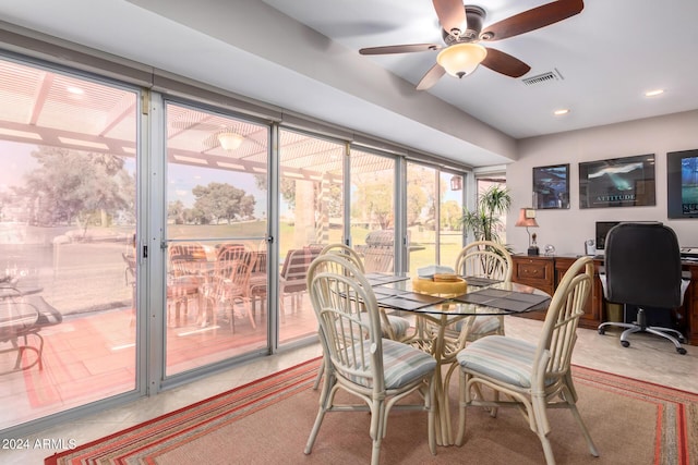 dining space featuring light tile patterned floors and ceiling fan