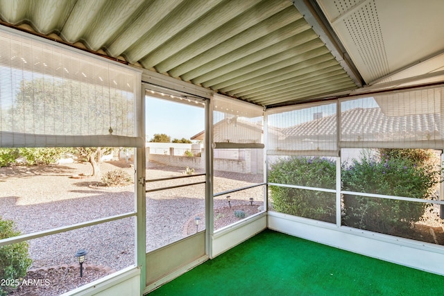 unfurnished sunroom with a healthy amount of sunlight