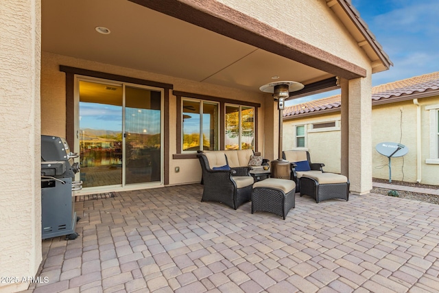 view of patio / terrace with outdoor lounge area and grilling area