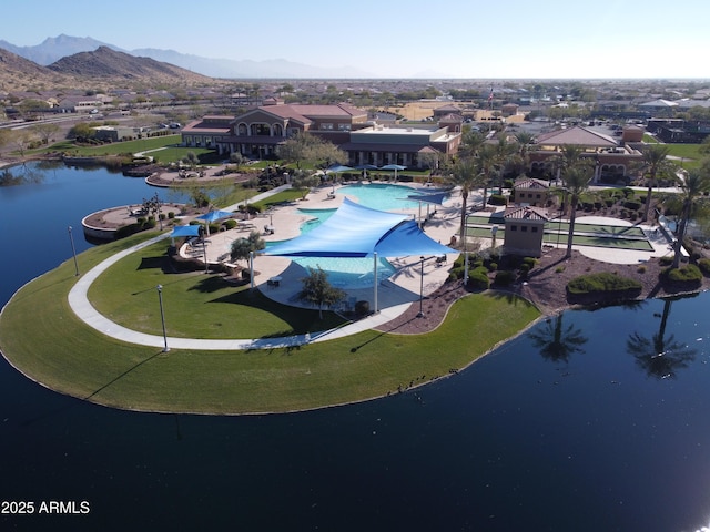 bird's eye view featuring a water and mountain view