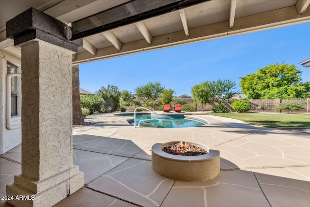 view of swimming pool with a patio area