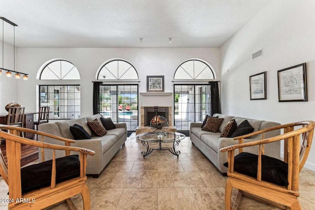 living room with a high ceiling