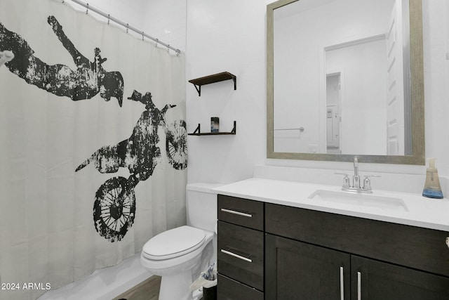 bathroom with vanity and toilet