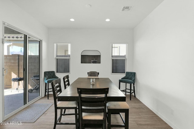 dining space with plenty of natural light