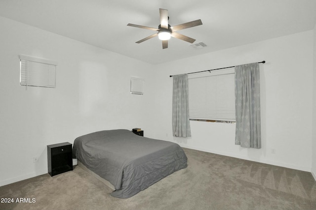 carpeted bedroom with ceiling fan and pool table