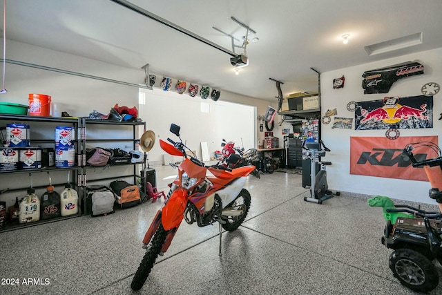 garage featuring a garage door opener